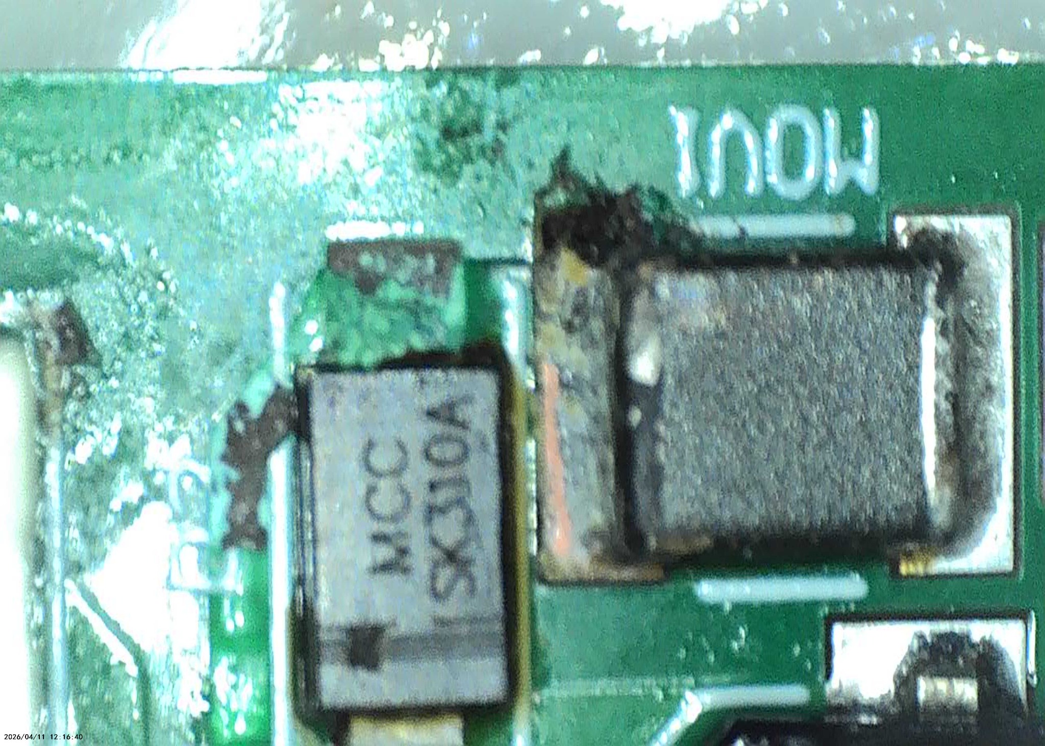 Close view of a surface-mounted component and its connections on the thruster controller PCB